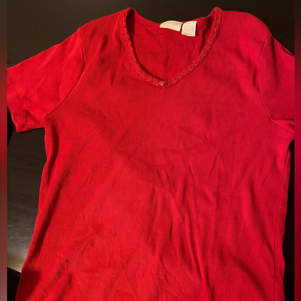 Selling an XL red ERIKA shirt for 6 dollars